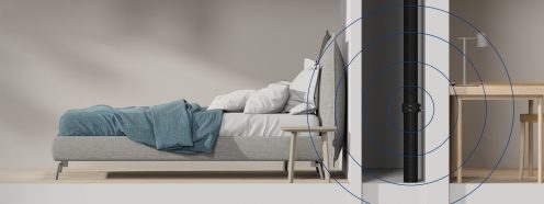 A visualization of an open wall in a multi-storey building, showing a Master3Plus soil stack installed in a wall that separates a bedroom and a home office | Pipelife