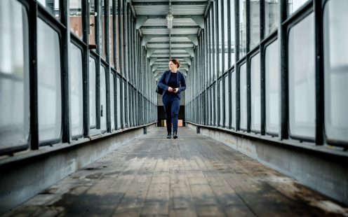 Woman walking in the hallway